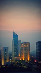 Jakarta, Indonesia – August 14, 2023: A sunset view cityscape of Indonesia capital city Jakarta