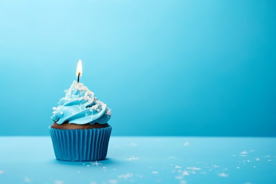 Blue Bliss: Small Birthday Cake on a Blue Background