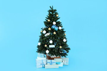 Decorated Christmas tree with gifts on a blue background