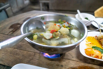 Spicy n-kaew soup is a spicy and intense-flavored Thai dish. 
It is known for its hot and sour taste and is a favorite among Thai people.