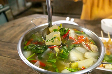 Spicy n-kaew soup is a spicy and intense-flavored Thai dish. 
It is known for its hot and sour taste and is a favorite among Thai people.