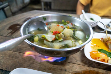 Spicy n-kaew soup is a spicy and intense-flavored Thai dish. 
It is known for its hot and sour taste and is a favorite among Thai people.