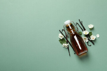 Vanilla extract in a bottle on a light background