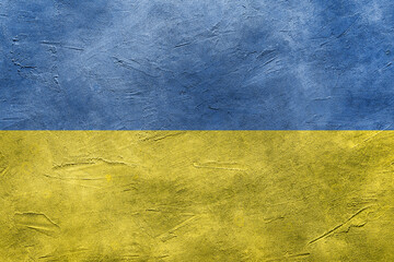 National flag of Ukraine painted on textured surface