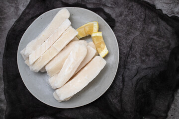 Fresh frozen squid on plate