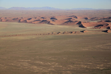 Fototapeta na wymiar aerial view of red sand desert