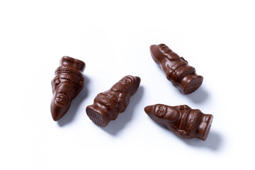 cheerful wrapped chocolate Santa Claus isolated on white background