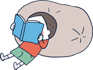 クッションを背に本を読む男の子