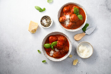 Homemade meatballs with tomato sauce and cheese