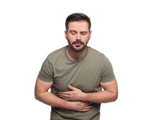 Obraz premium Man suffering from stomach pain on white background