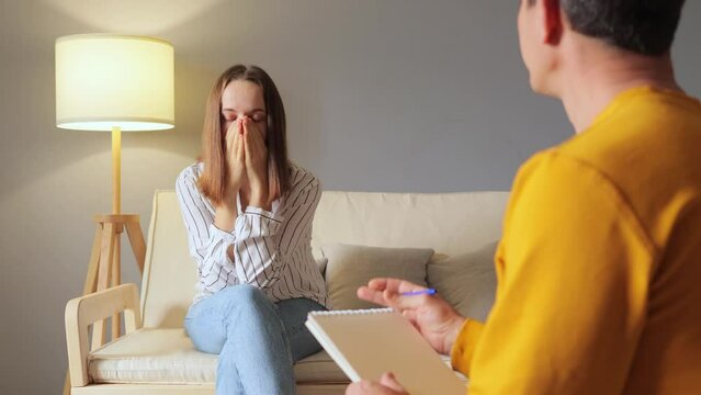 Support visit. Mental health support session. Professional therapist provided valuable advice and psychotherapy to help woman patient with her mental health problem.