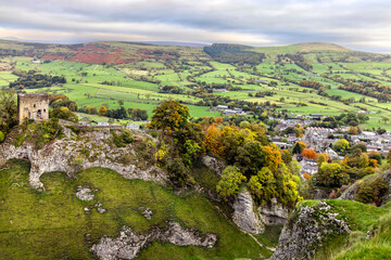 Peveril Castle, a ruined 11th-century castle overlooking the village of Castleton in Derbyshire,...