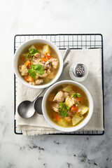 Homemade salmon soup with vegetables