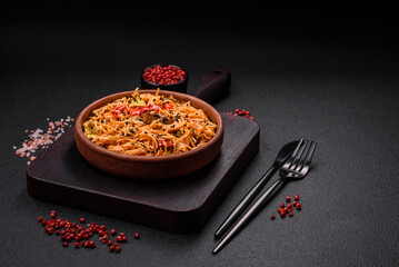 Delicious udon noodles with meat or seafood, vegetables, salt and spices