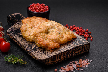 Delicious baked chicken or turkey chops with salt, spices and herbs