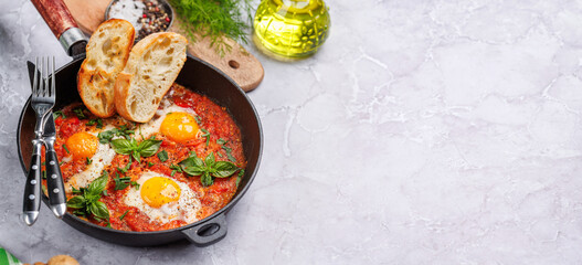 Delicious shakshuka breakfast in a pan