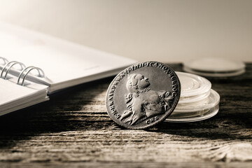 Numismatics. Old collectible coins on the table. - 675249103