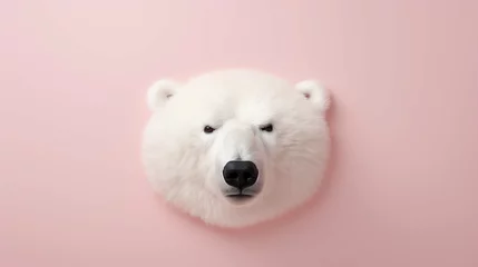 Kussenhoes A small tufted rug in the shape of a flat polar bear's head on a light pink wall © Esha