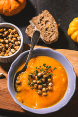 Homemade pumpkin soup with crispy roasted chickpeas	 - 675252366