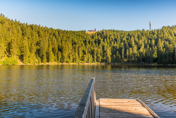 Morning mood at Mummelsee Lake in the Black Forest, view to the Hornisgrinde, Black Forest National Park, Seebach, Baden-Wuerttemberg, Germany - obrazy, fototapety, plakaty