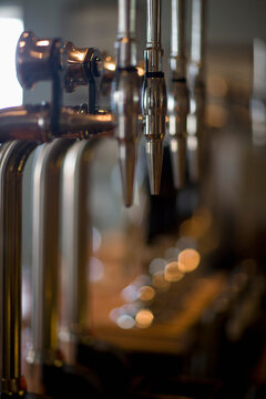 Close up of beer pumps
