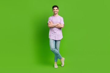 Full length photo of nice handsome man dressed fashionable outfit isolated on green color background