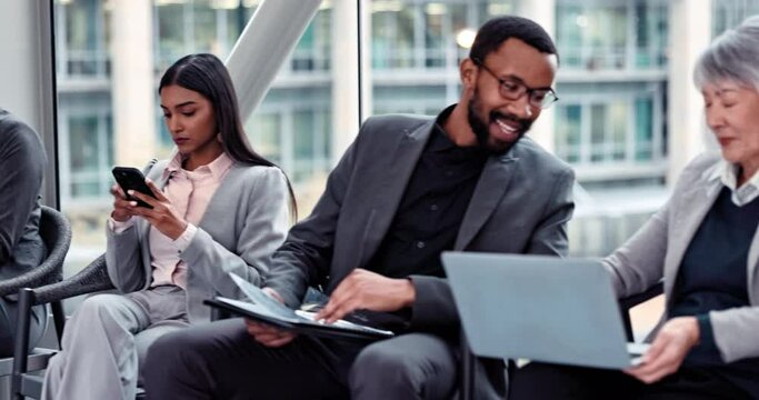 Technology, interview and business people in waiting room share job information or notes in conversation. Discussion, communication and corporate candidate group speaking of work opportunity