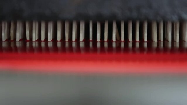 A mechanized line for the production of matches, where the blanks are sorted and the composition of the match head is skillfully applied to obtain a stable result.