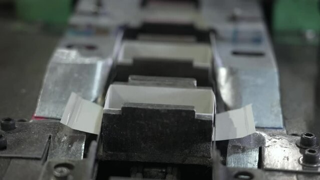 A mechanized line for the production of matches, where the blanks are sorted and the composition of the match head is skillfully applied to obtain a stable result.