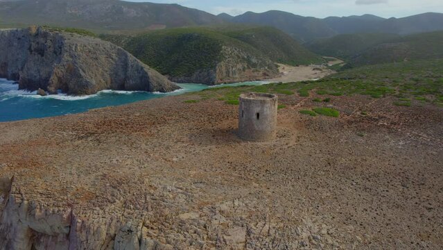 Fantastic remote aerial view of the Torre di Cala Domestica, on the island of Sardinia and overlooking the Cala Domestica.