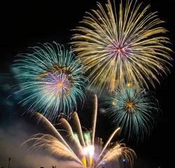 Fototapeten Colorful Fireworks Light Up the Night Sky in Celebration of New Year's Eve 2024 © Franklin