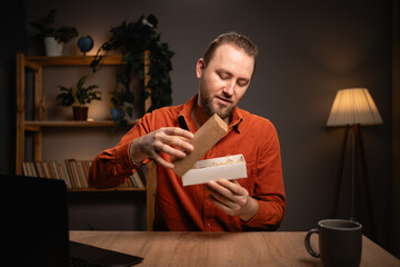 Technology, blogging and people concept. Social media technology influencer recording unboxing video at home