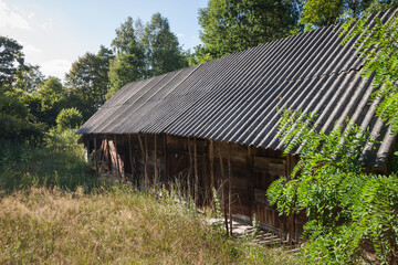 Old wooden barn. Rural courtyard