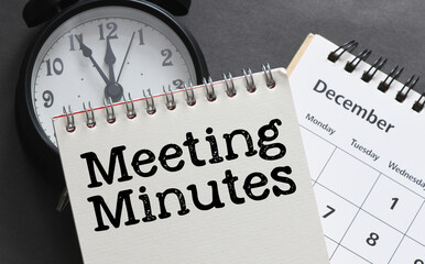 Concept of Meeting Minutes write on notepad.
