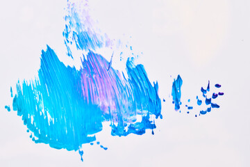 Acrylic multicolor paint blot, chaotic brushstroke, spot flowing on white paper background. Creative blue color backdrop, fluid art.