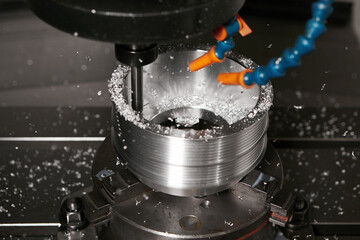 Metalworking CNC milling machine. Metal cutting, modern processing technology. Industrial...