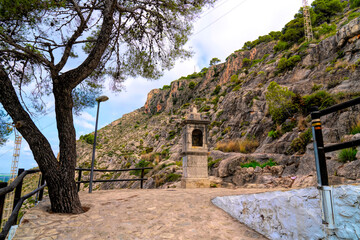 Fototapeta na wymiar Estacion Septima the seventh of fourteen historic religious structures on the walk up to the castle Cullera, Spain