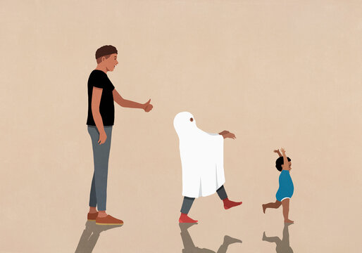 Father watching child in ghost costume chase baby son
