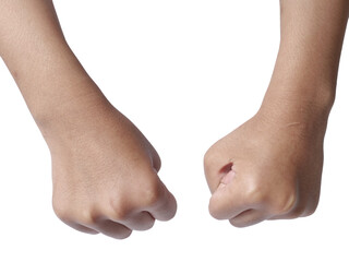 Little girls hand doing punching fist gesture, cut out isolated