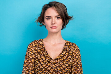 Photo of charming nice girlfriend wear glamour print blouse posing model stylish clothes brown haircut isolated on blue color background