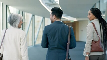 Back, walking and business people at work, talking and in the office in the morning. Communication, travel and corporate employees with a discussion, speaking and together as a group or team