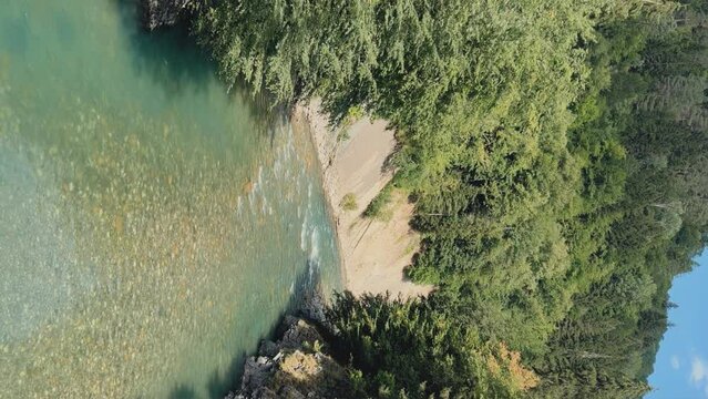The Bolshaya Laba River. A mountain emerald river in a narrow, sunlit canyon. Bolshaya Laba River near the village of Psemen in Karachay-Cherkessia, Russia. Panoramic view. 4K