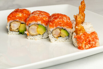 sushi roll with avocado and shrimp tempura