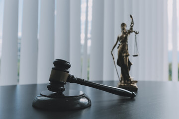 Consultation and conference of Male lawyers and professional businesswoman working and discussion having at law firm in office. Concepts of law, Judge gavel with scales of justice.