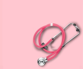 Breast cancer concept. stethoscope on pink background