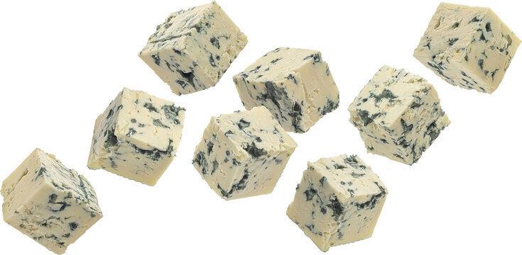 Falling blue cheese cubes isolated on white background