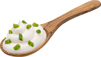 Wooden spoon of sour cream with green onion isolated