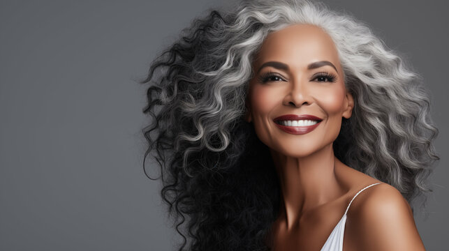 Portrait of smiling mature beautiful black woman over gray background. Beauty, cosmetics skincare and dental advertising concept. Generative AI.