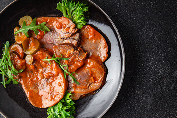 beef tongue hot sauce fresh delicious eating meal cooking appetizer food snack on the table copy space food background © Alesia Berlezova