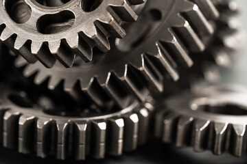 Gear and cogs wheels, clock mechanism, brass metal engine industrial.